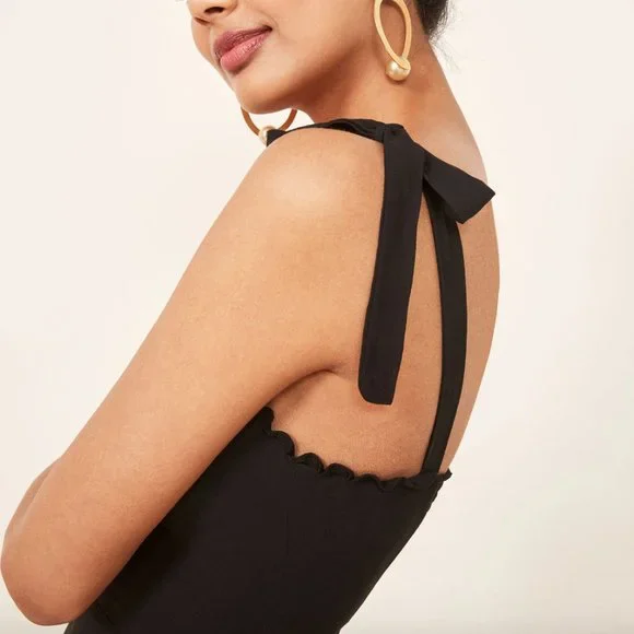 reformation christine dress black  Little Black Dress Alert!  Check out this NWT Reformation Christine  Dress in black, size 0. This flirty mini dress features charming tie  straps, back smocking, and a playful ruffled hem. Perfect